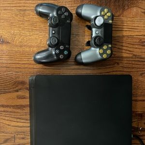 PlayStation 4 with 2 controllers